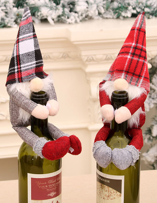 Estatuilla De Santa Claus De Navidad Sosteniendo Una Botella De Vino